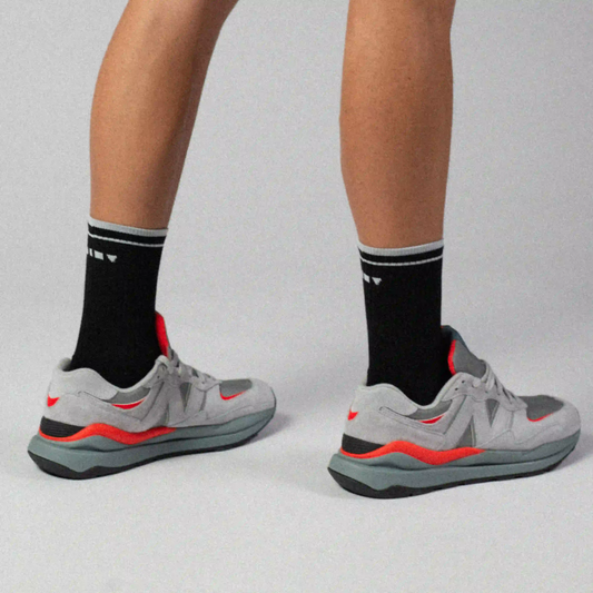 What makes the best athletic sock? Clay Active's black retro court socks studio image.